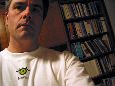 Self portrait with ByeWire t-shirt. Calgary. 03 March 2002. Copyright © 2002 Grant Hutchinson