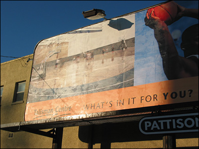 Late afternoon billboard. 14th Street Northwest, Calgary. 16 January 2004. Copyright © 2004 Grant Hutchinson